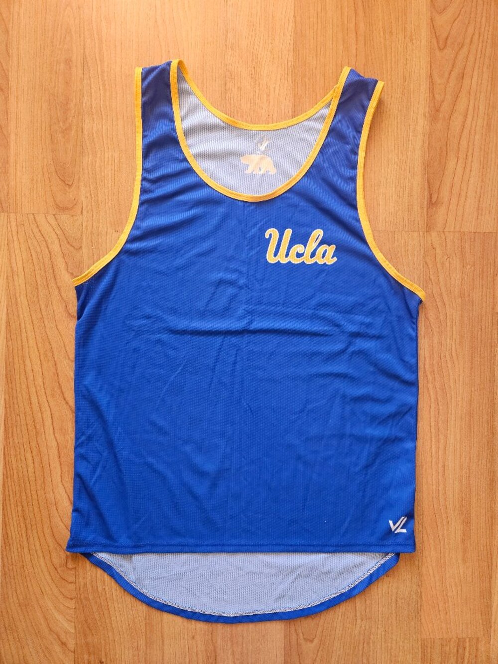 Never worn! Men's lightweight UCLA Blue tank by JL Racing - Medium
